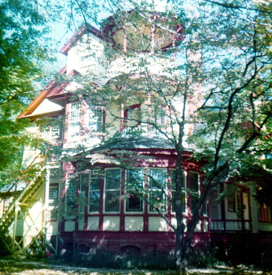 Vintage red and white exterior of mansion